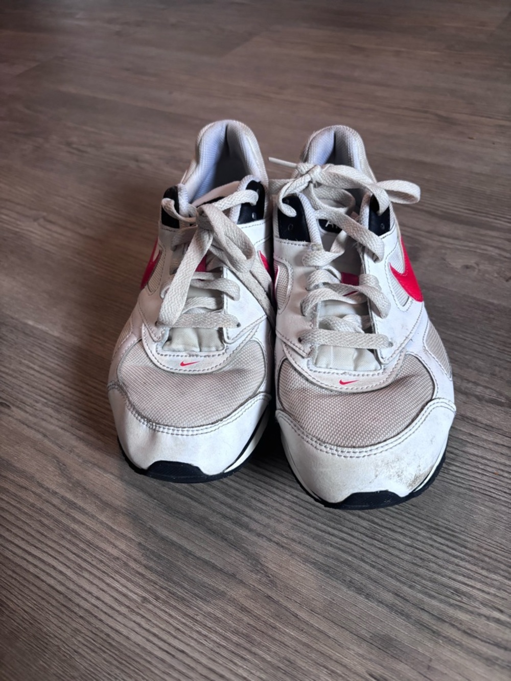 Nike Kids White Sneakers with orange Swoosh